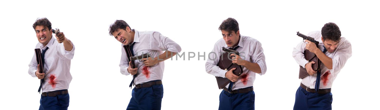 Businessman wounded in gun fight isolated on white