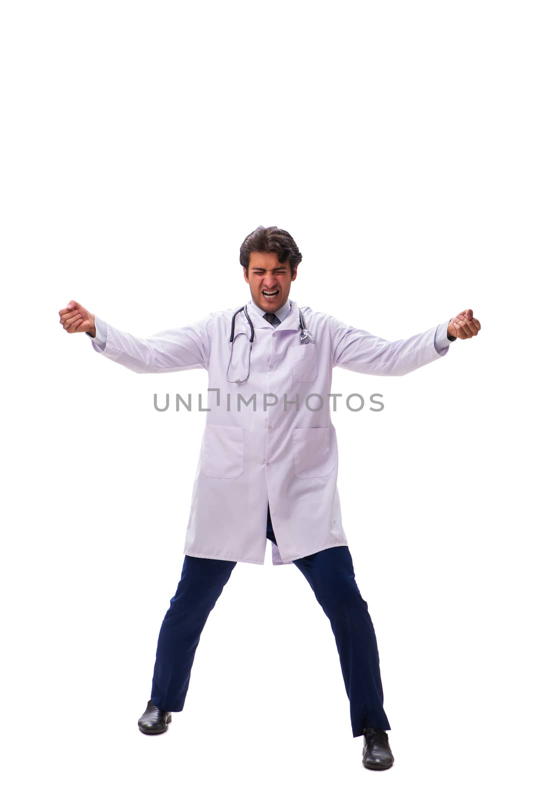 Young handsome doctor under pressure isolated on white