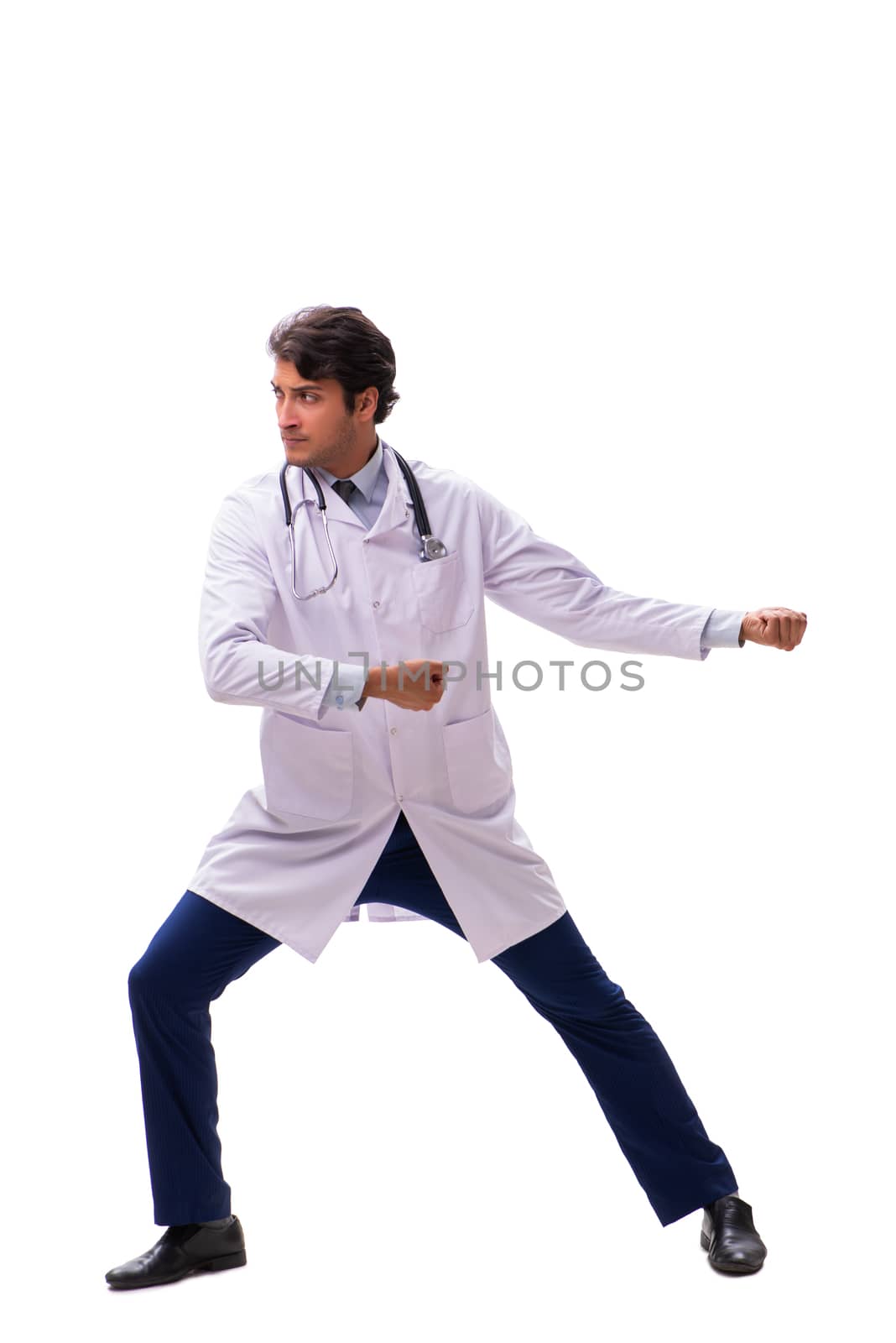 Young handsome doctor under pressure isolated on white