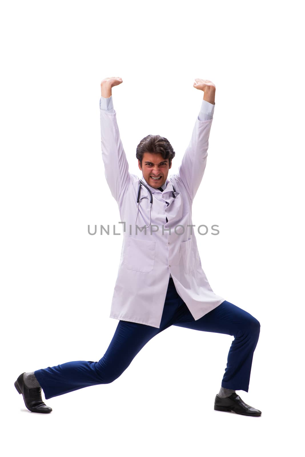 Young handsome doctor under pressure isolated on white