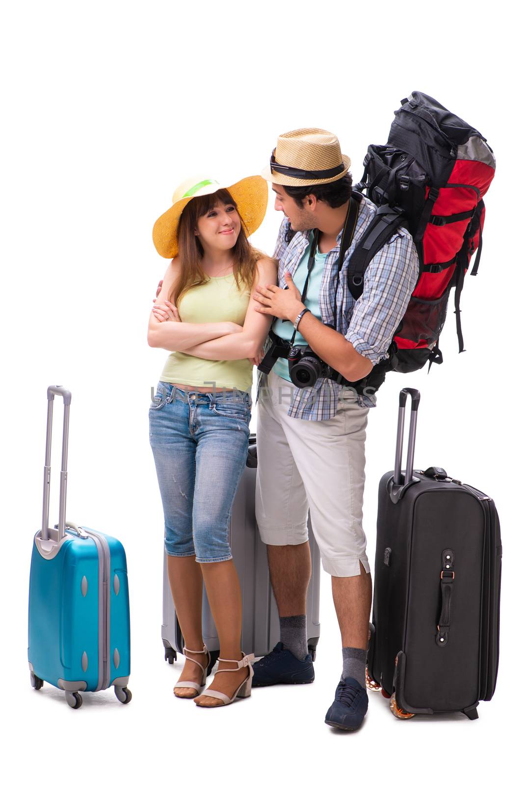 Young family preparing for vacation travel on white by Elnur