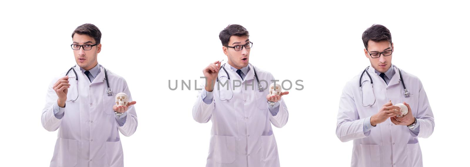 Young male doctor with skeleton isolated on white