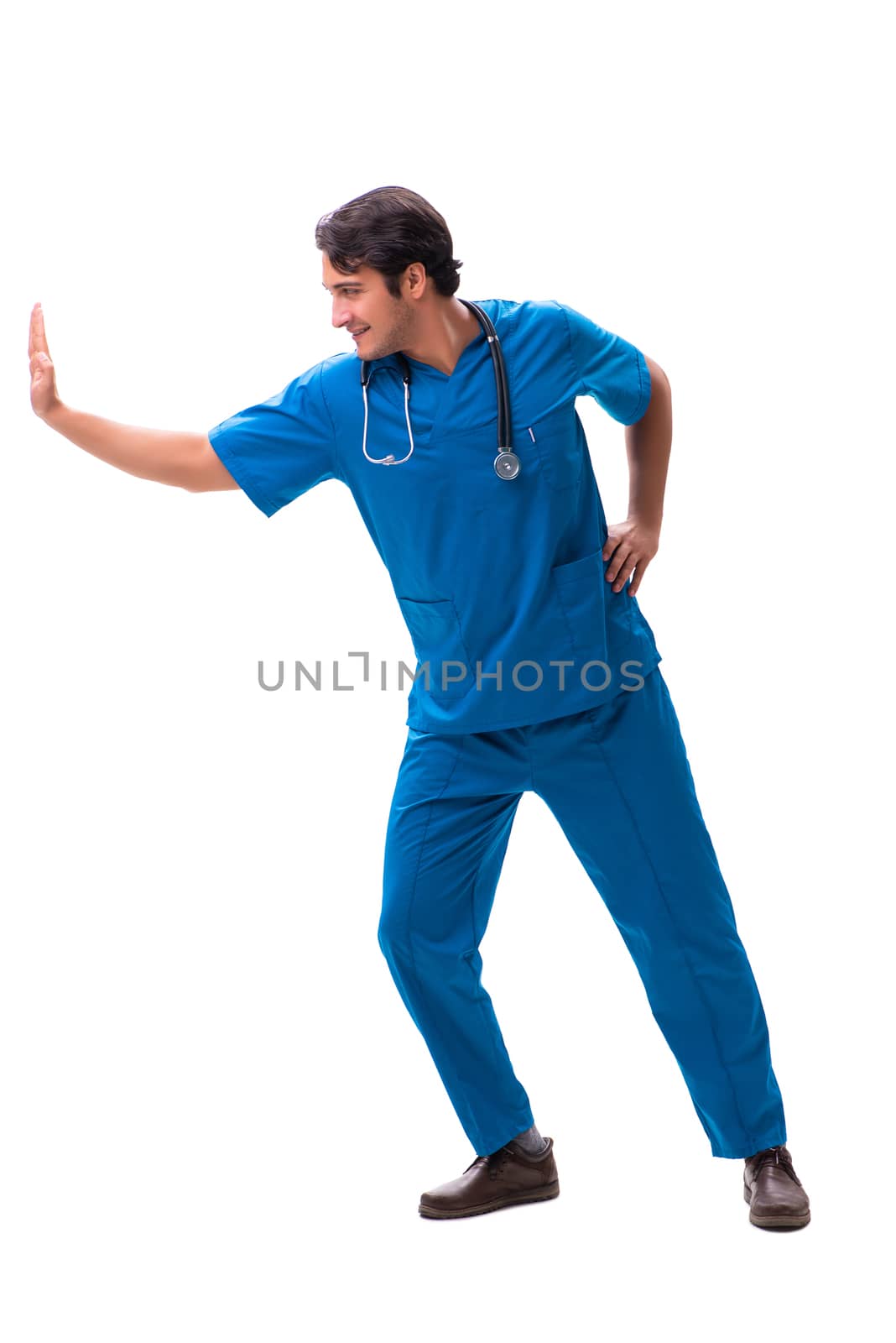 Young handsome doctor isolated on white