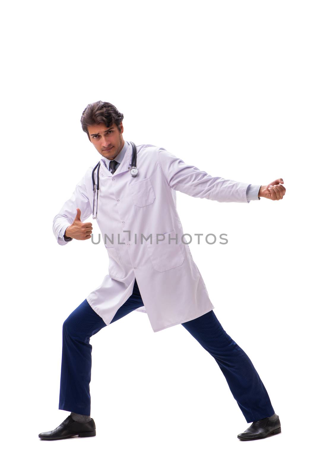 Young handsome doctor under pressure isolated on white