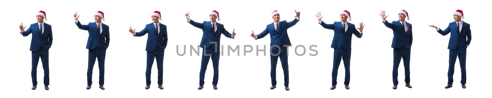 Young busnessman wearing santa hat in christmas concept on white