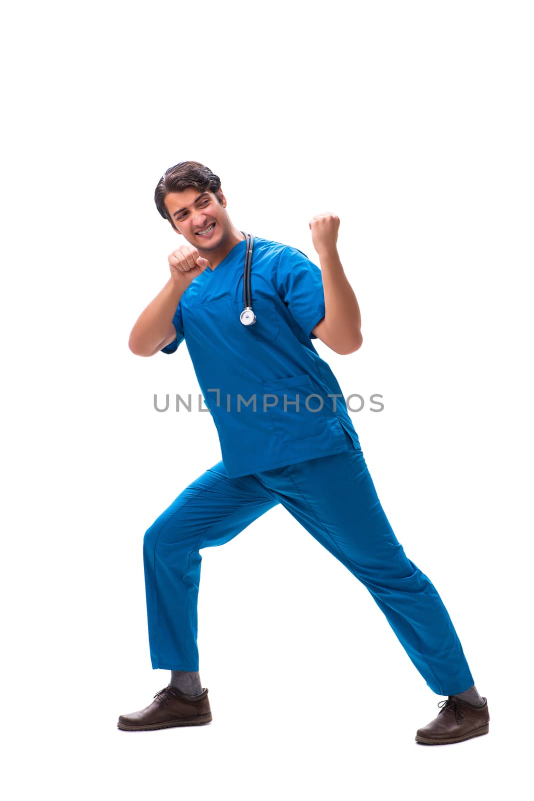 Young handsome doctor isolated on white