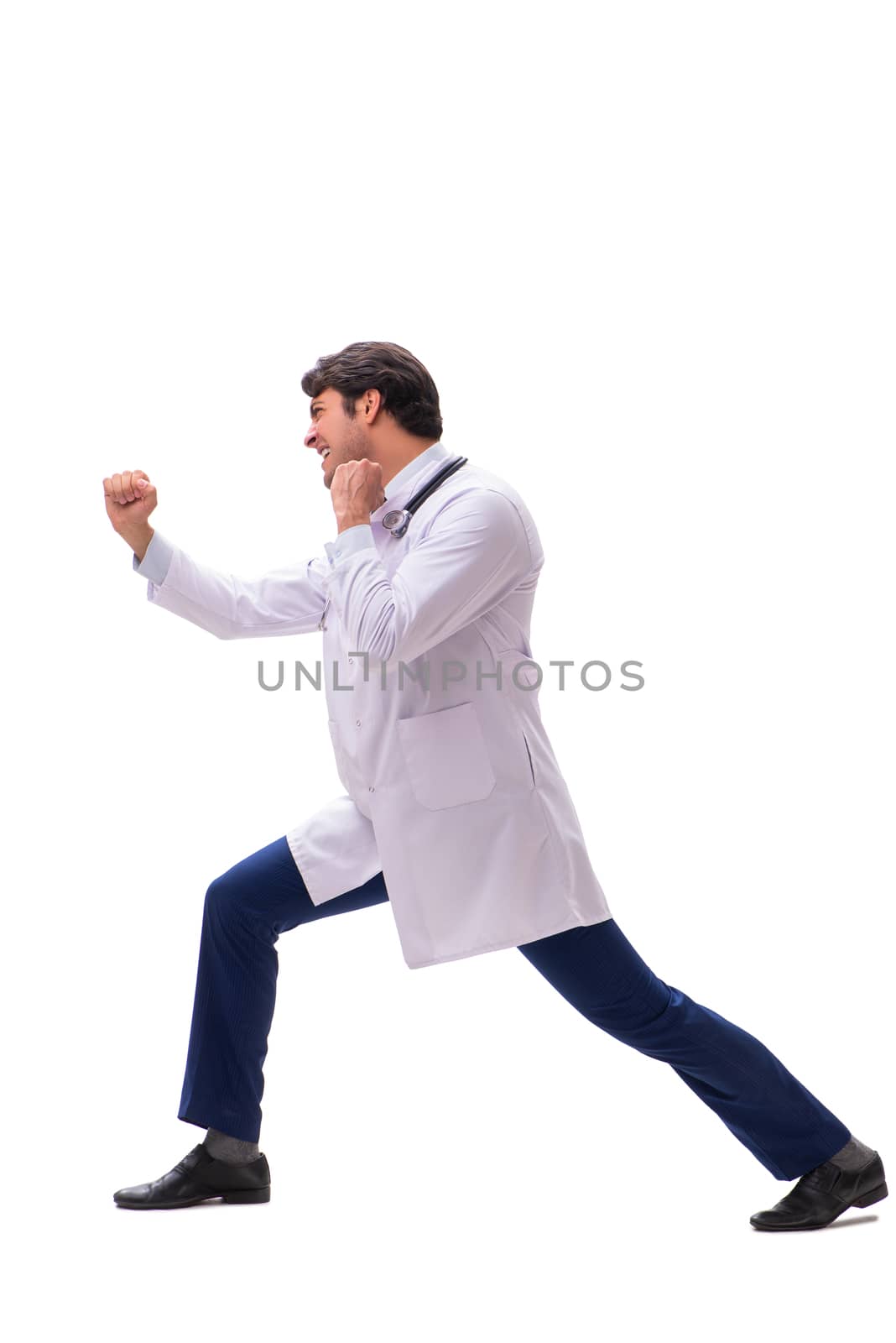 Young handsome doctor under pressure isolated on white
