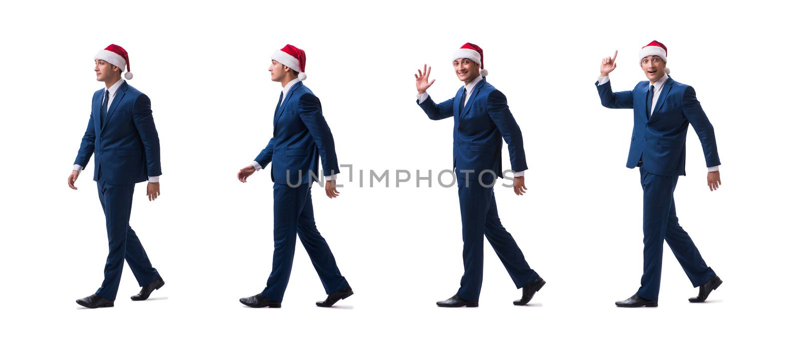 Young busnessman wearing santa hat in christmas concept on white