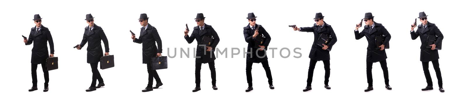 Man spy with handgun isolated on white background