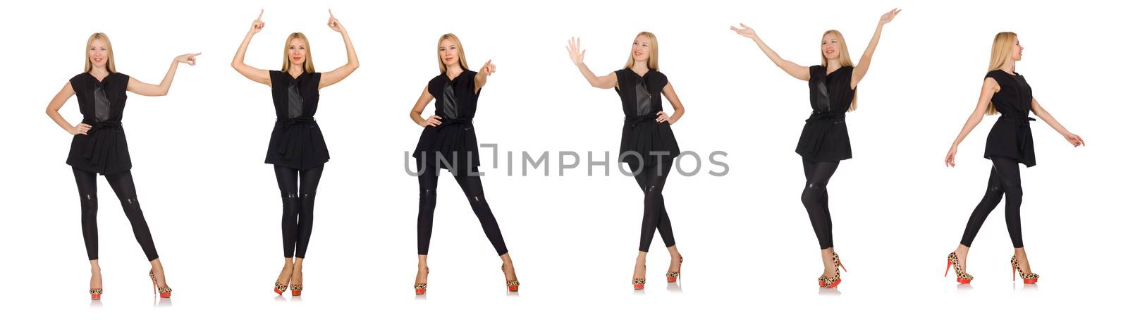 Pretty woman in tight black pants isolated on white