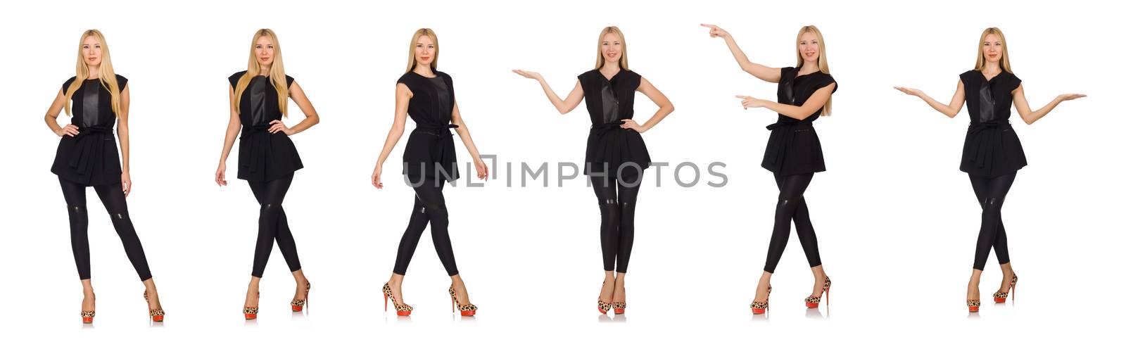 Pretty woman in tight black pants isolated on white