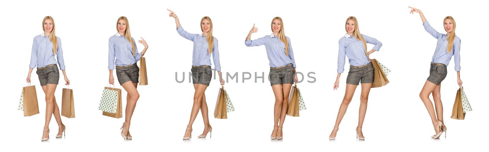 Young woman after shopping isolated on the white