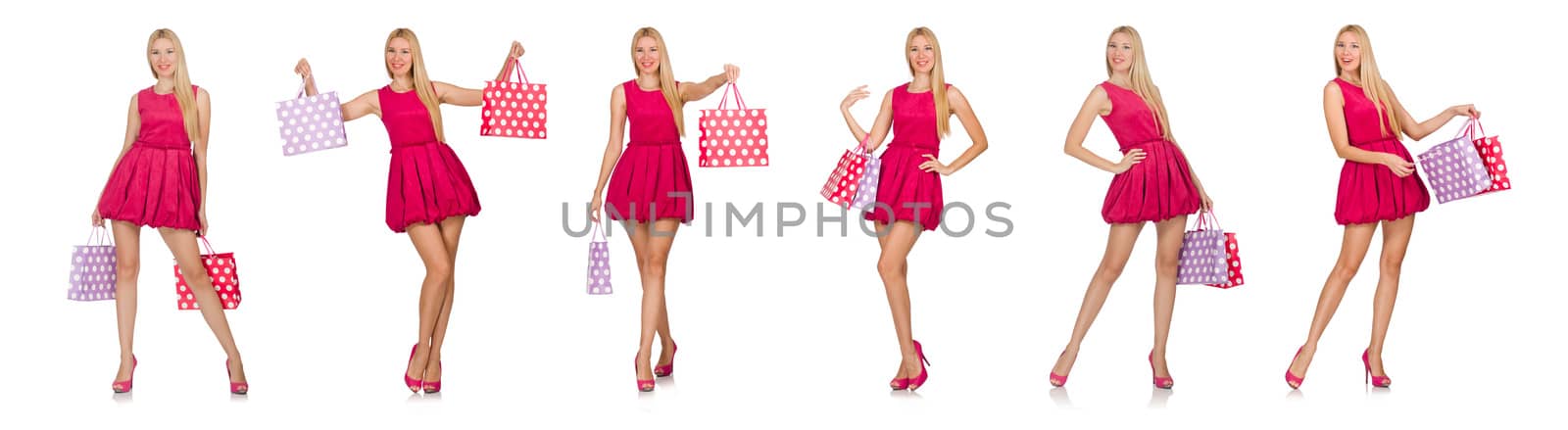 Woman with shopping bags isolated on white