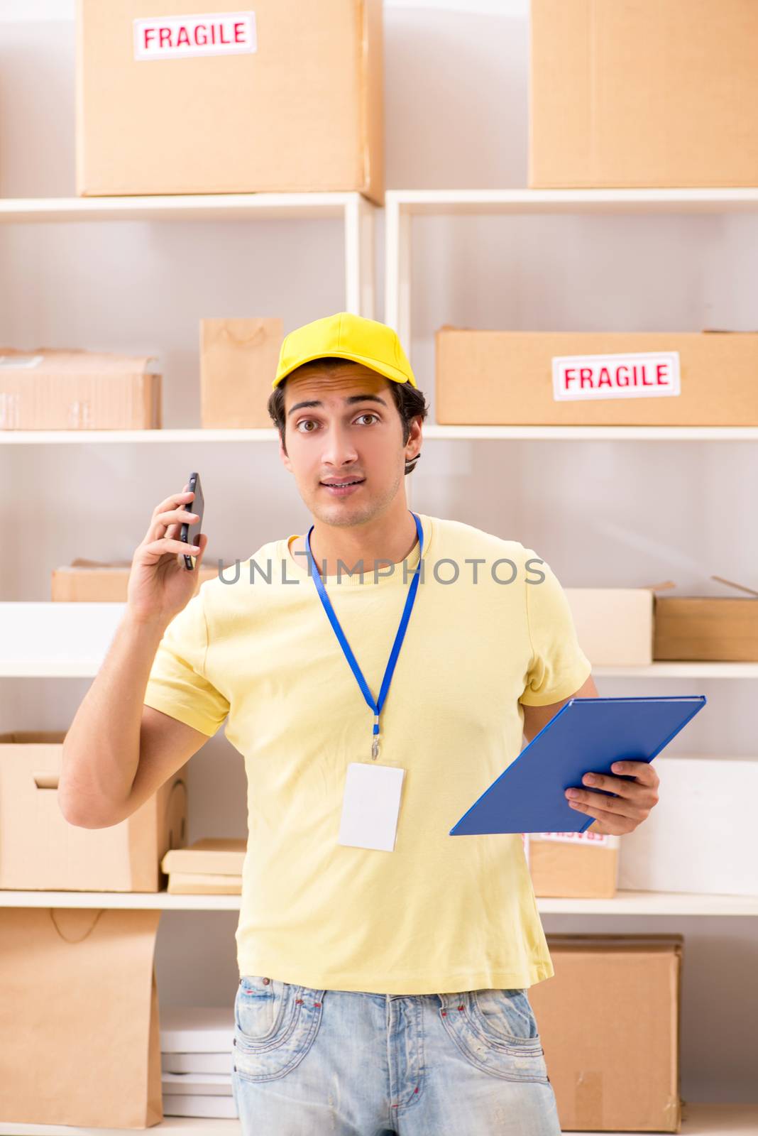 Handsome contractor working in box delivery relocation service 