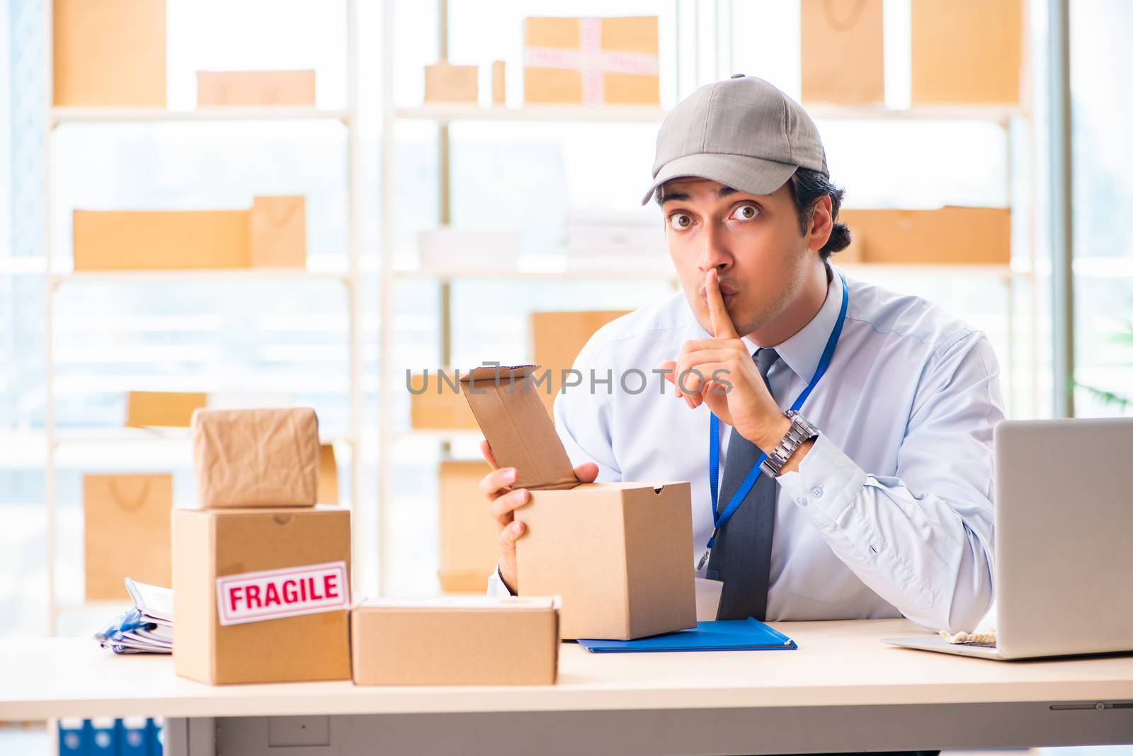 Male employee working in box delivery relocation service