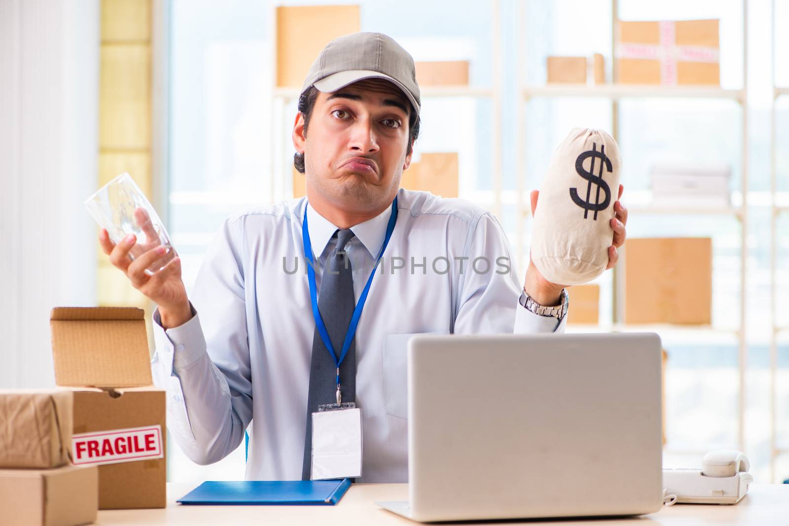 Male employee working in box delivery relocation service