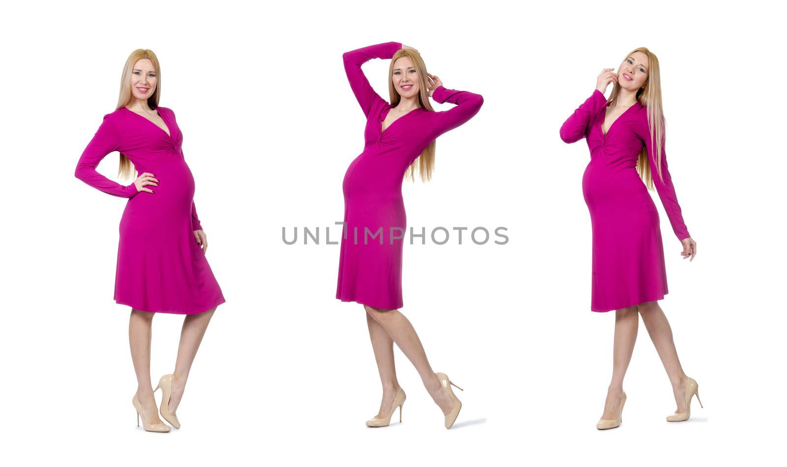 Pretty pregnant woman in pink dress isolated on white