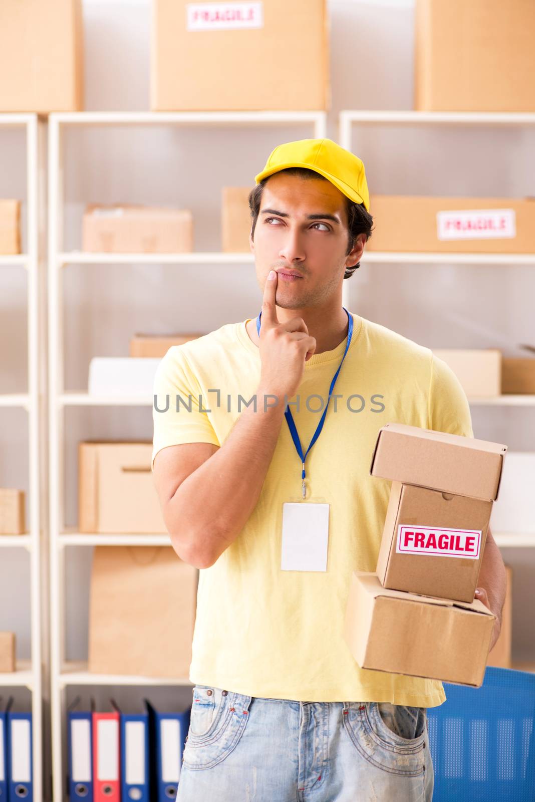 Handsome contractor working in box delivery relocation service 
