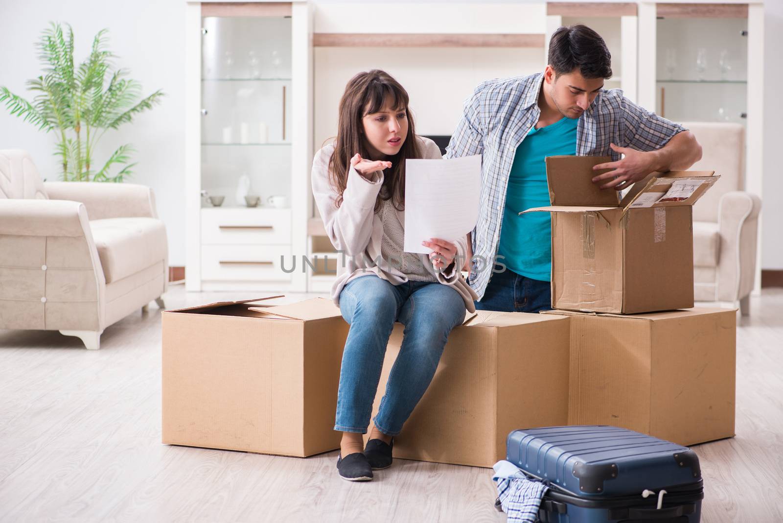 Young couple receiving foreclosure notice letter