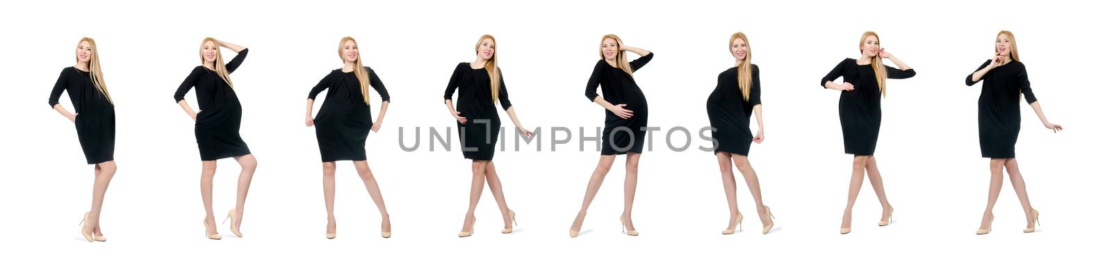 Pretty pregnant woman in mini black dress isolated on white