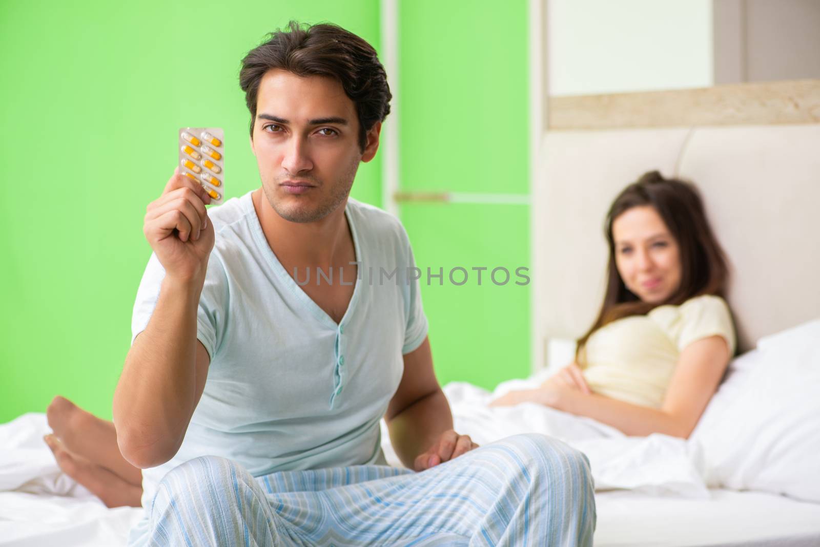 Man using pills for woman satisfaction  