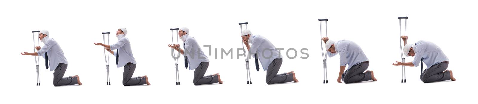 Injured businessman isolated on white 