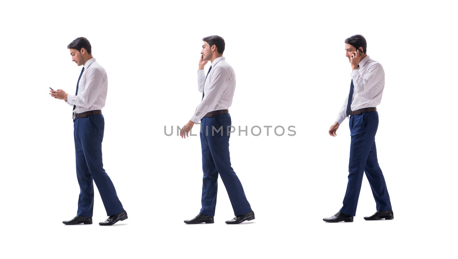 Businessman walking standing side view isolated on white background