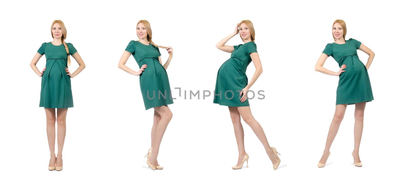 Beautiful pregnant woman in green dress isolated on white