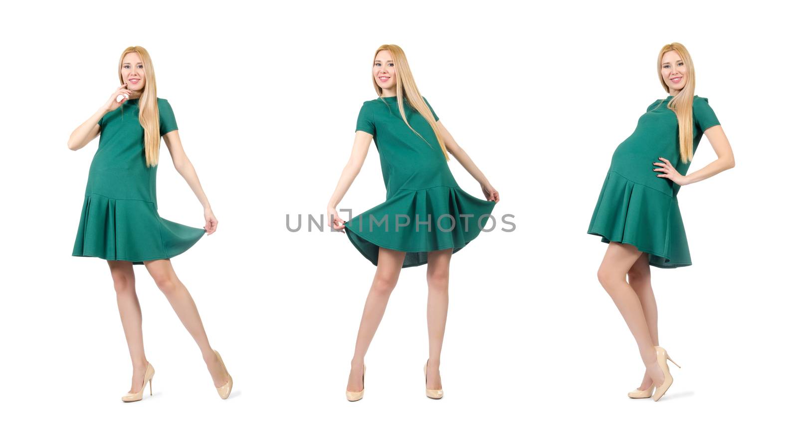 Beautiful pregnant woman in green dress isolated on white