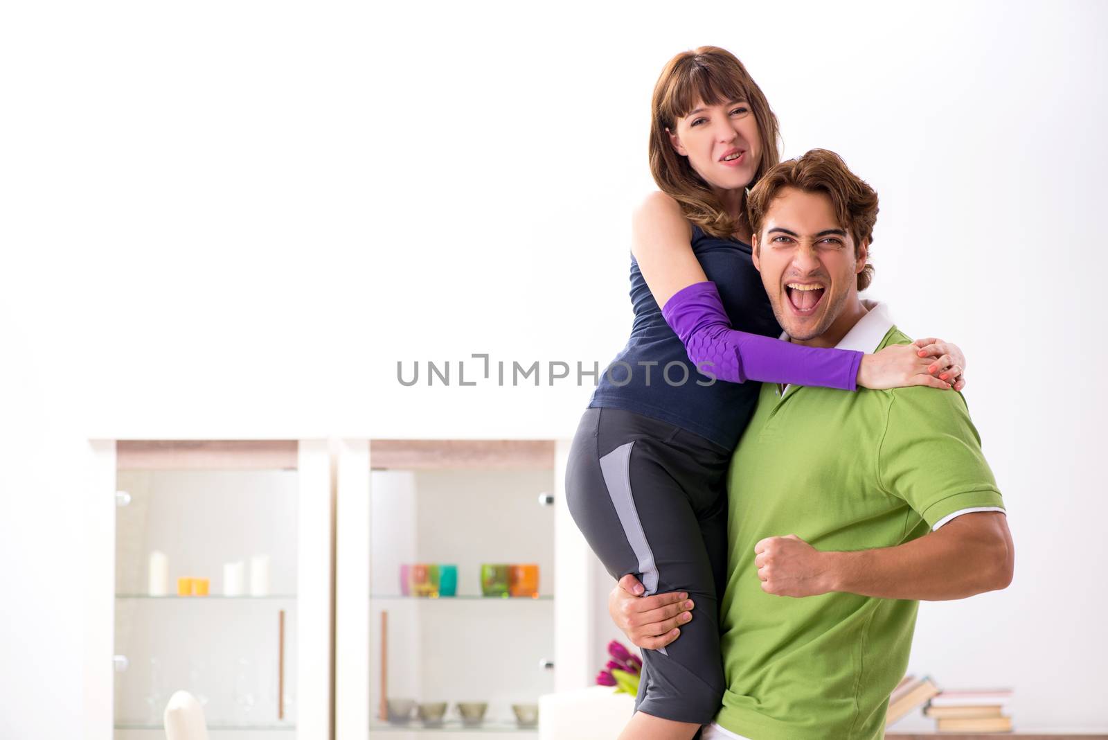 Man and woman discussing sports injury