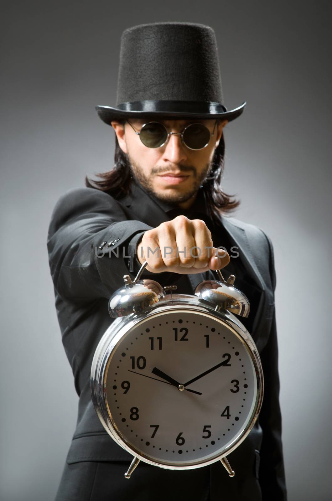 Vintage concept with man wearing black top hat