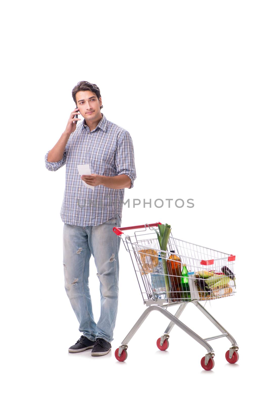 Young man with supermarket cart trolley on white