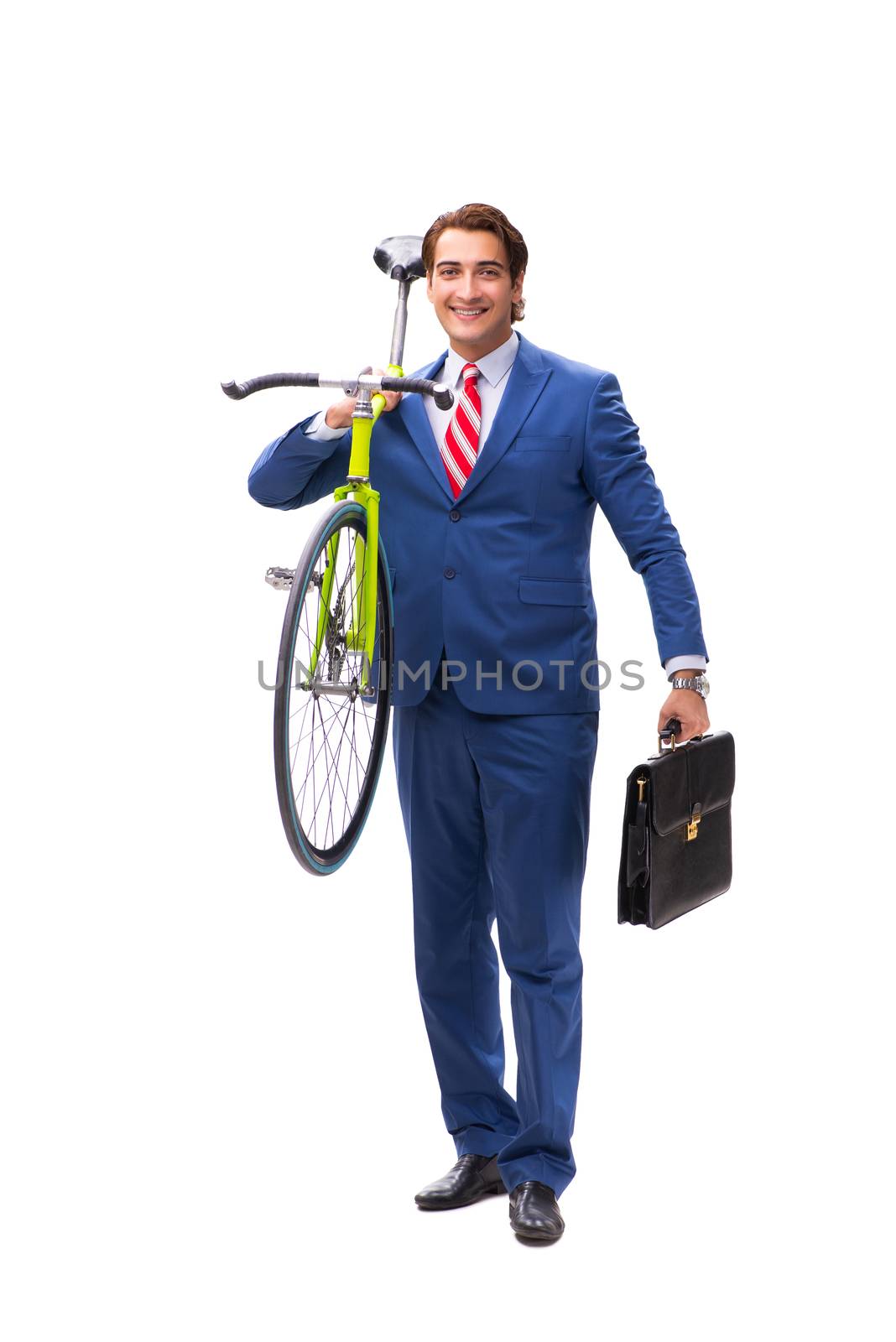 Young businessman using bike to commute to the office