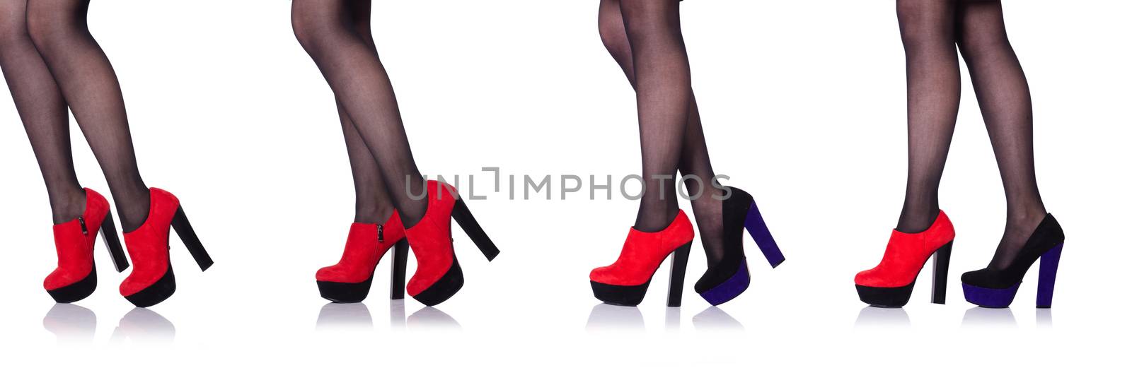 Woman legs with red shoes isolated on the white by Elnur