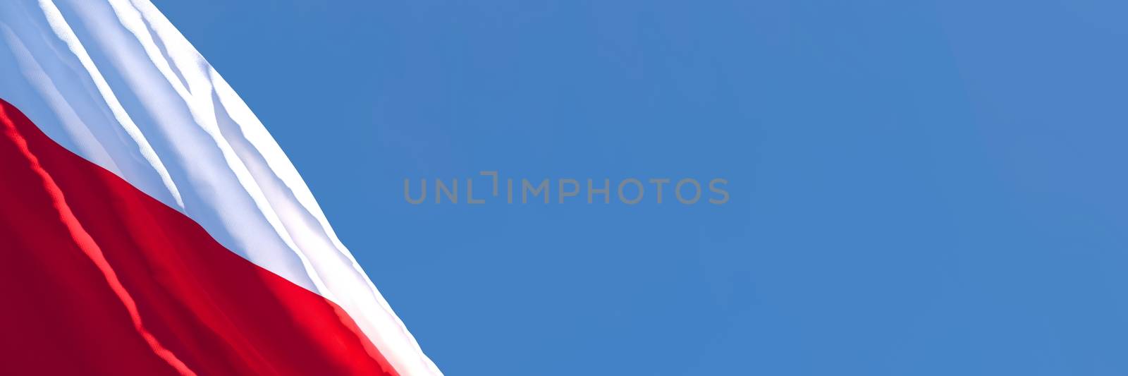 3D rendering of the national flag of Poland waving in the wind against a blue sky