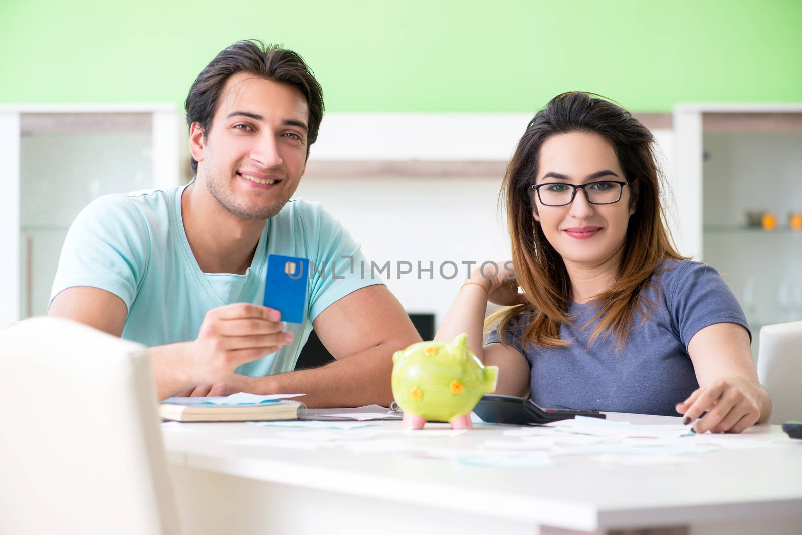 Young family struggling with personal finance by Elnur