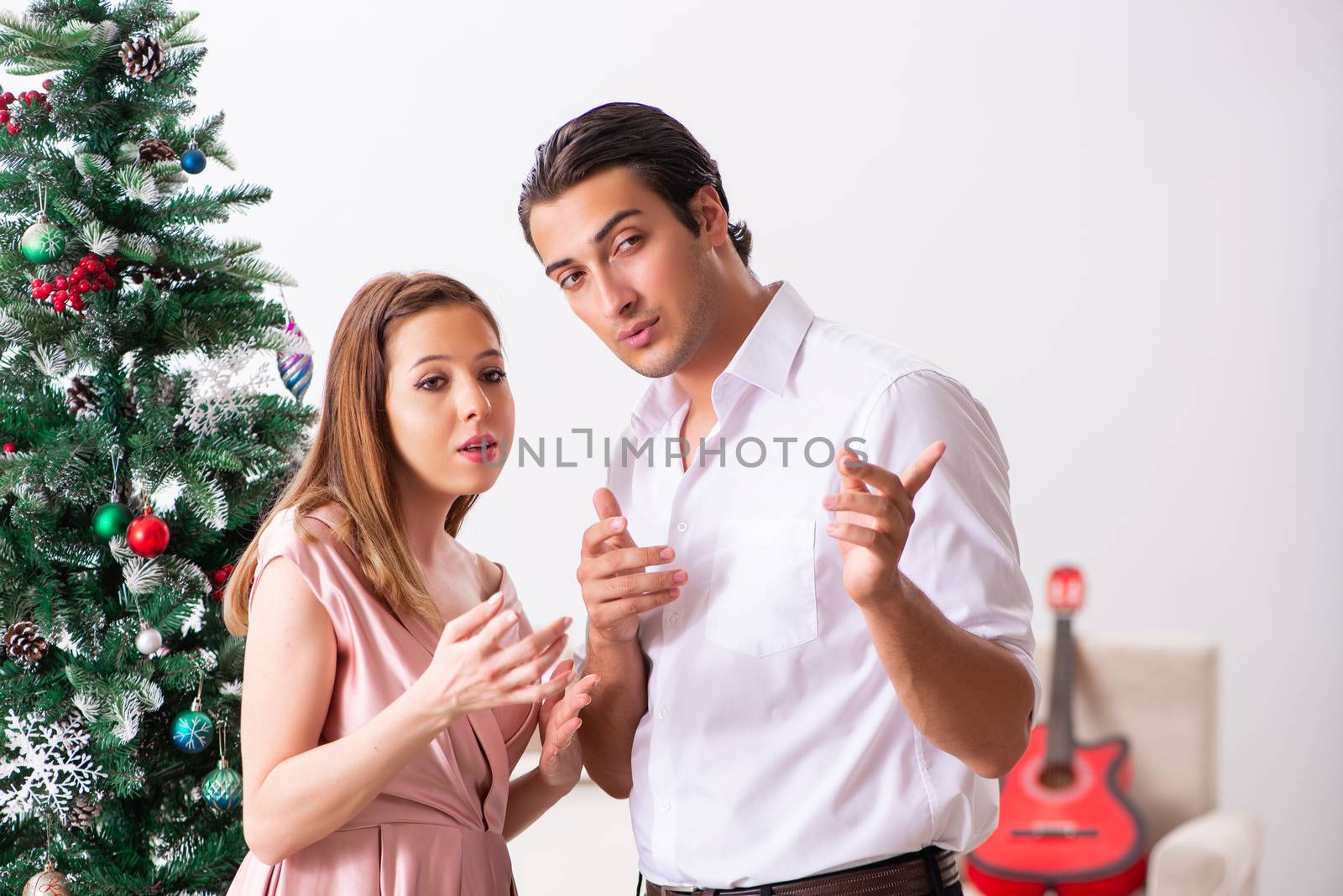 Young couple on romantic christmas date by Elnur