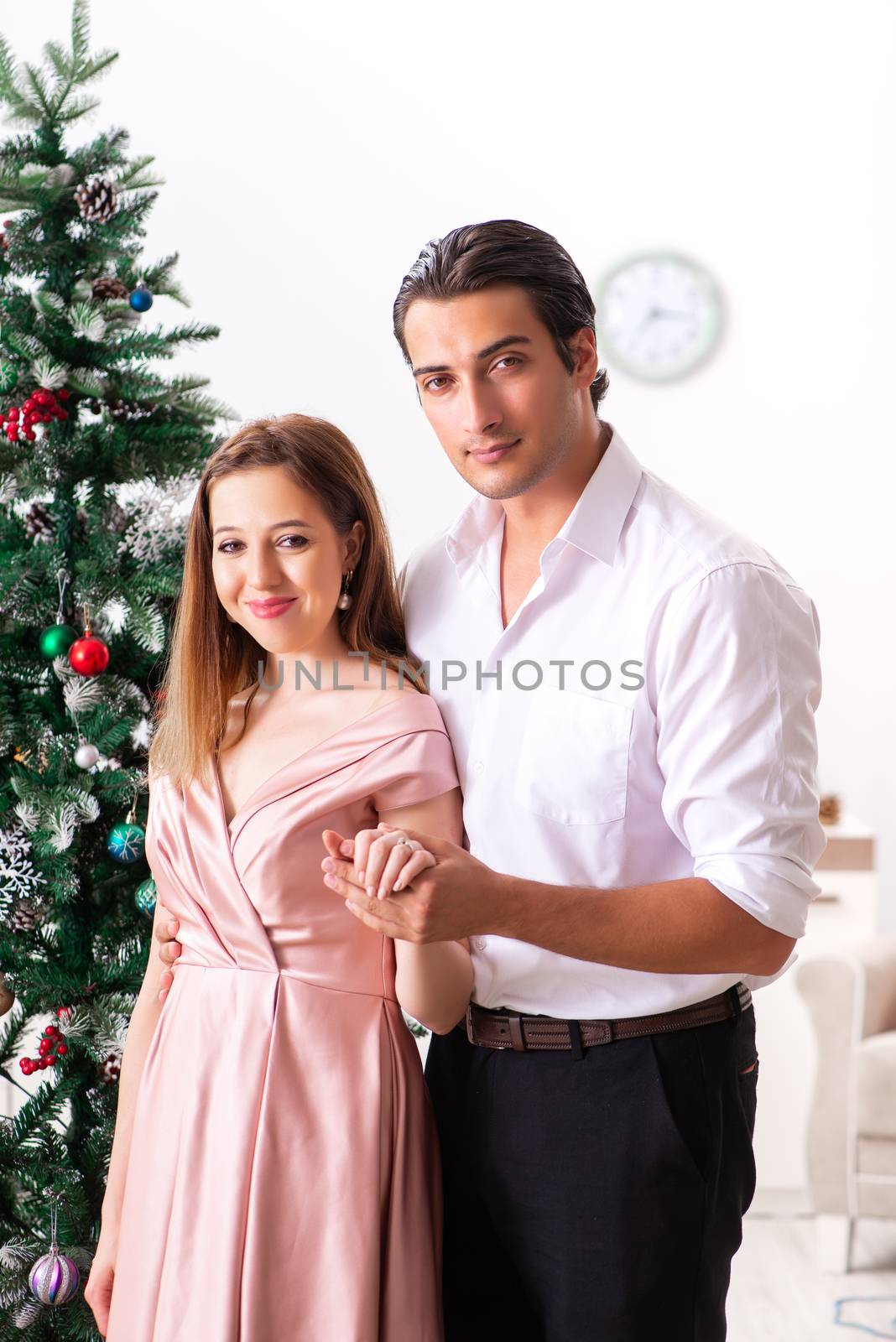 Young couple on romantic christmas date by Elnur