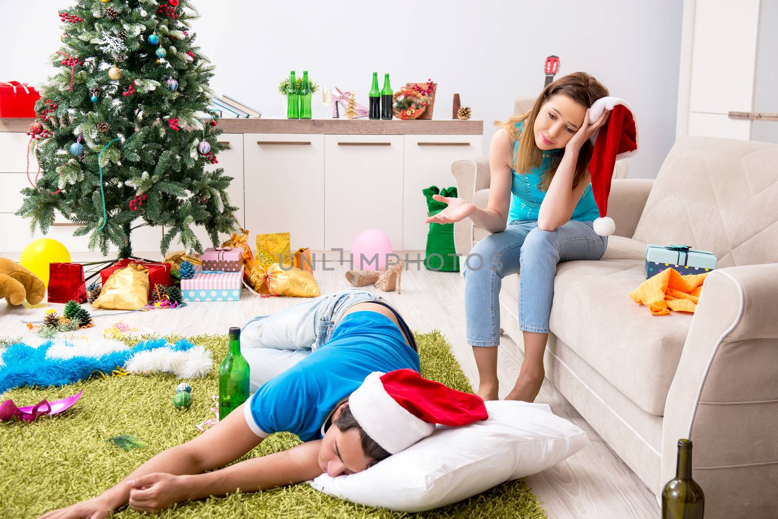 Young family celebrating christmas at home