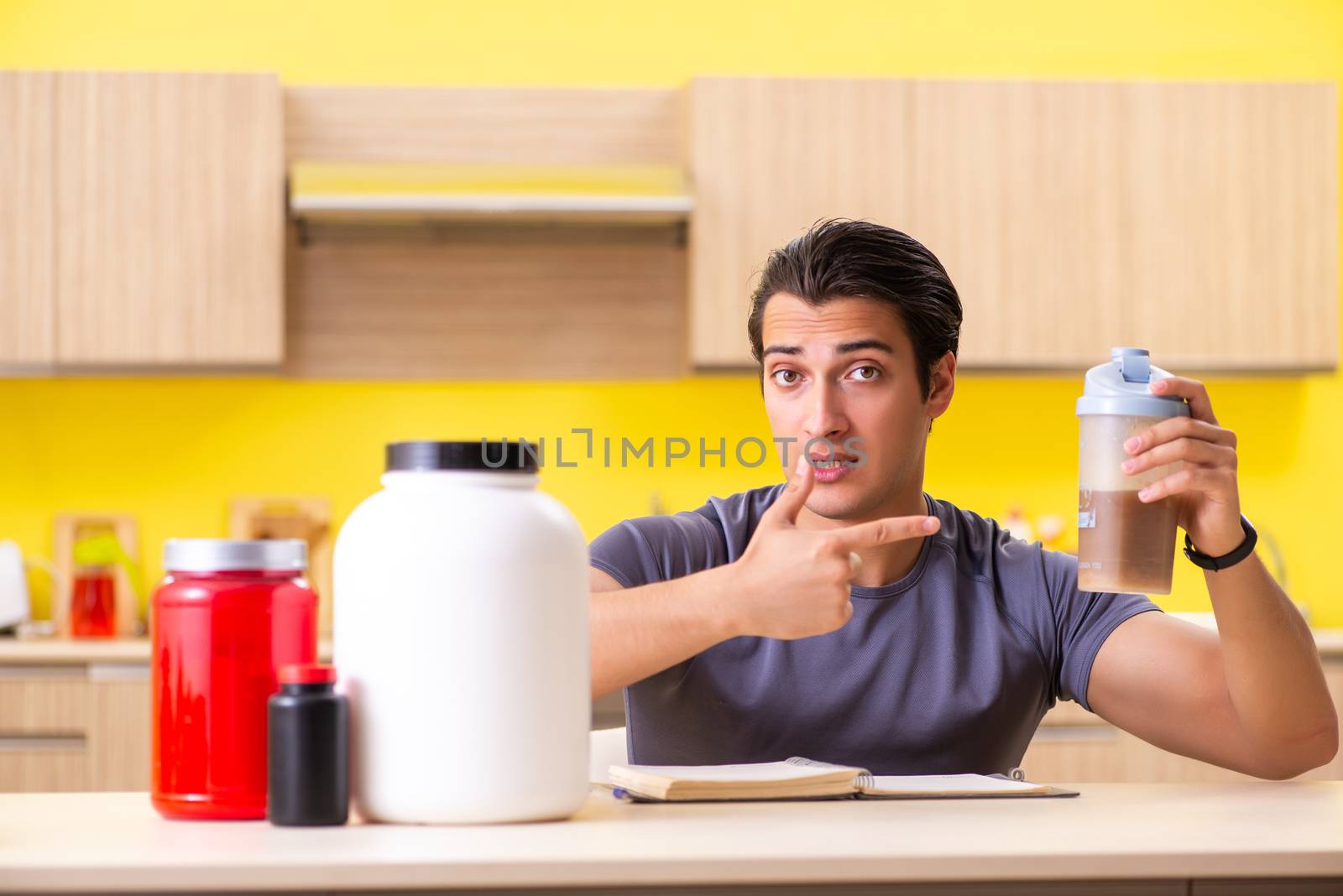 Young man blogging about food additives