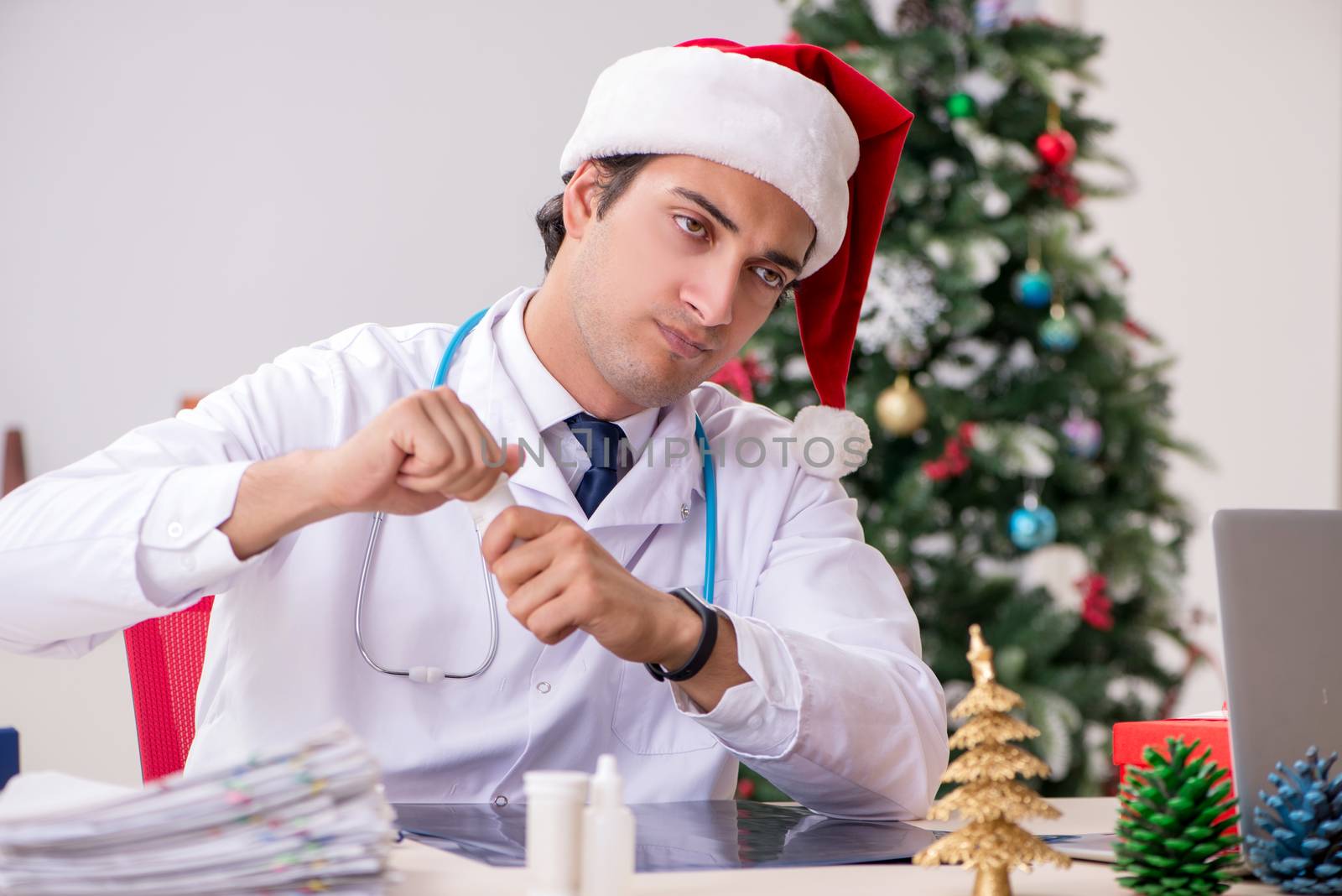 Doctor on the shift on christmas eve