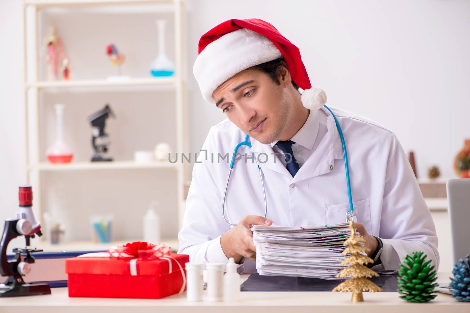 Doctor with gift box in the hospital