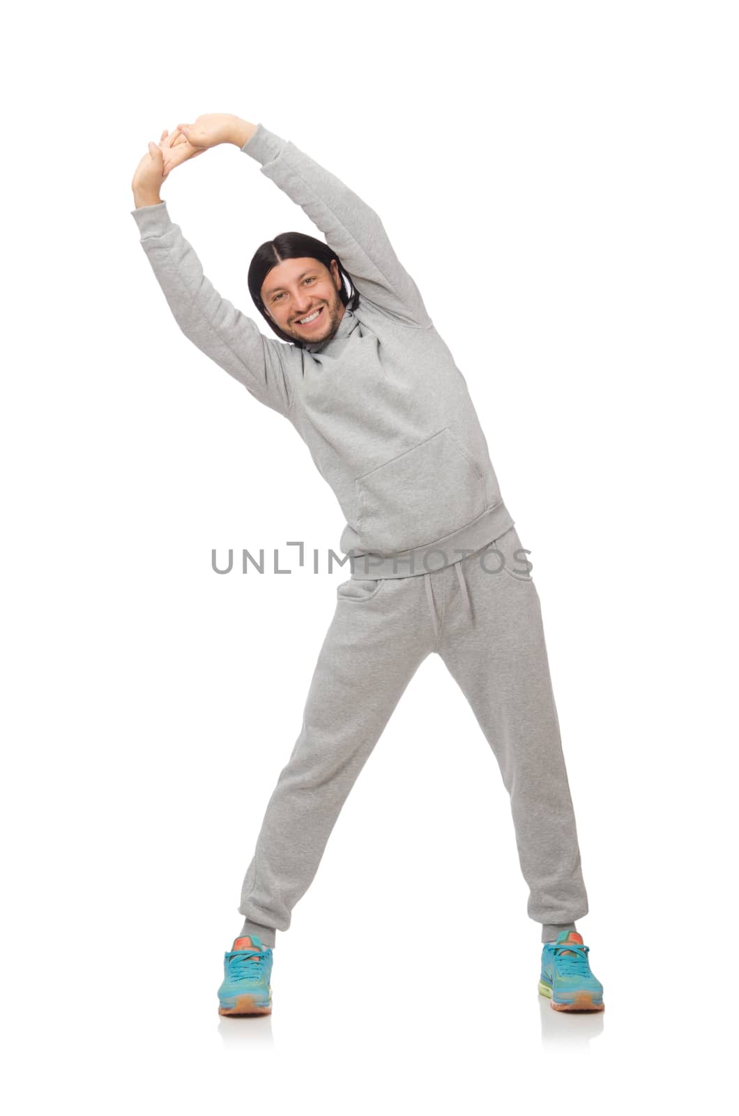 Young man exercising isolated on white background