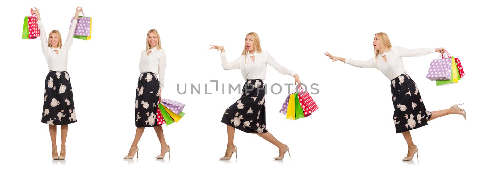 Woman with shopping bags isolated on white