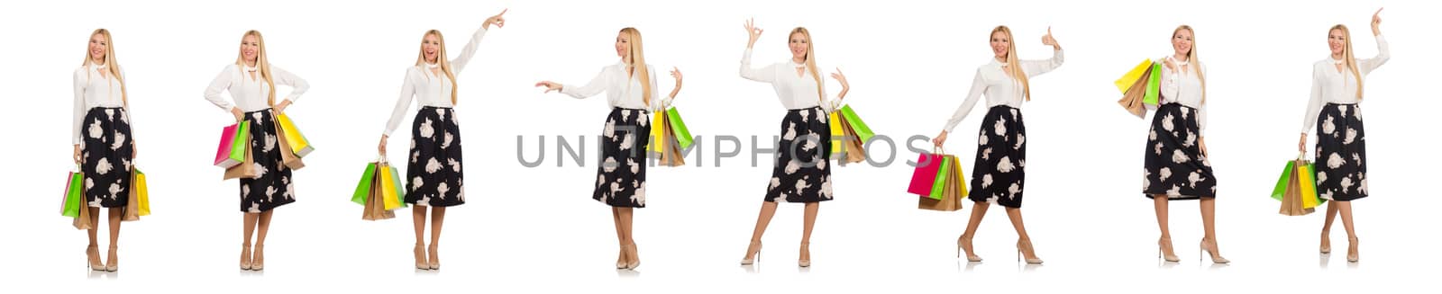 Woman with shopping bags isolated on white