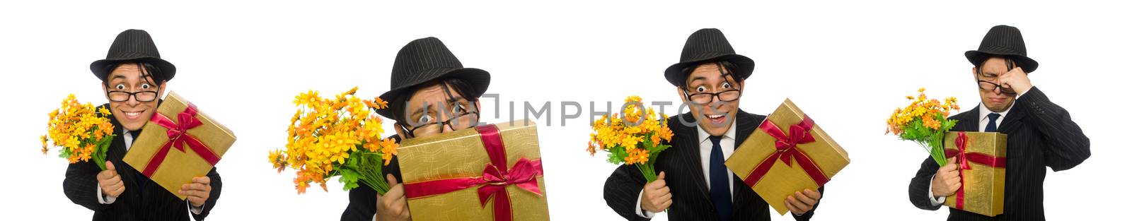 Gentleman with gift box and flowers isolated on white