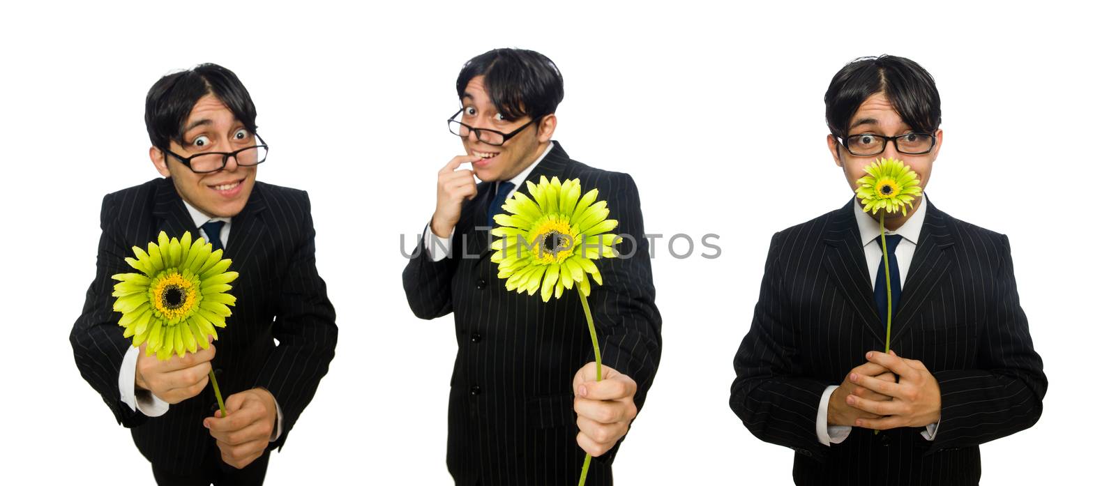Young man in black costume with flower isolated on white