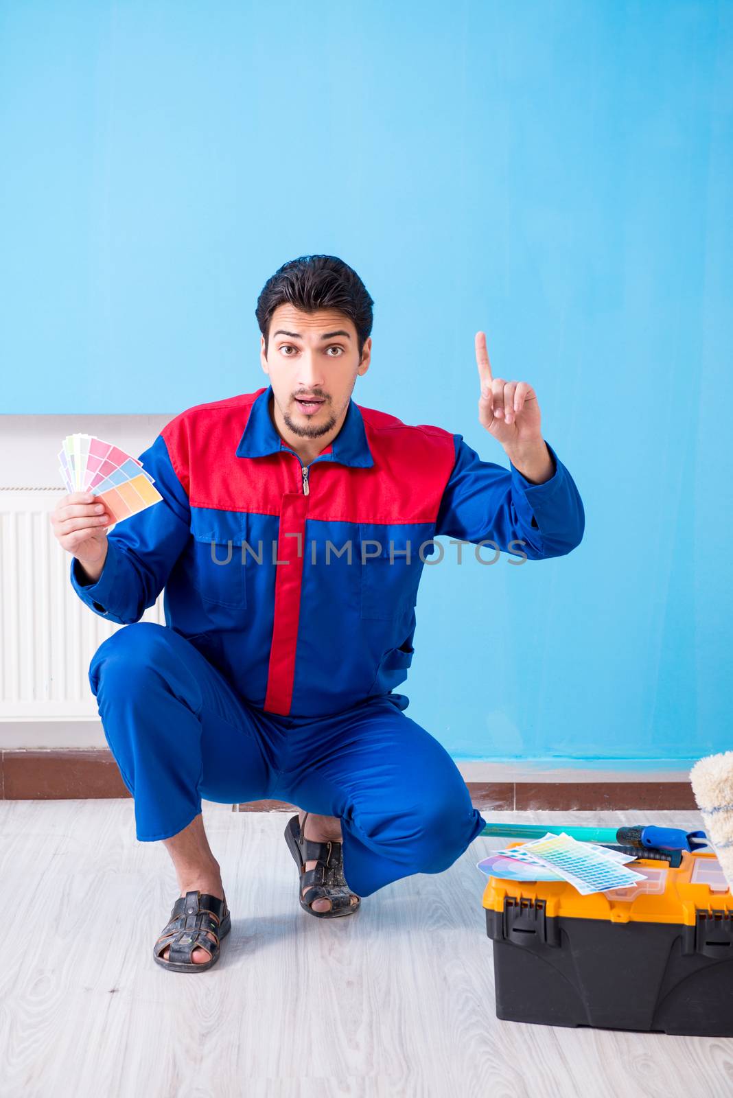 Young man doing home renovation 