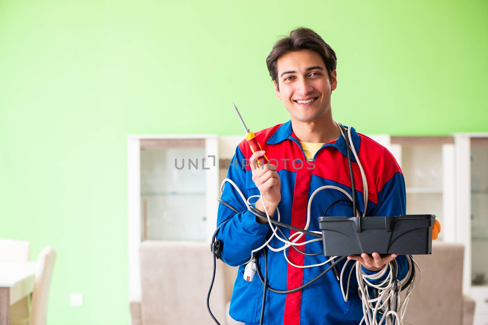 Electrician contractor with tangled cables