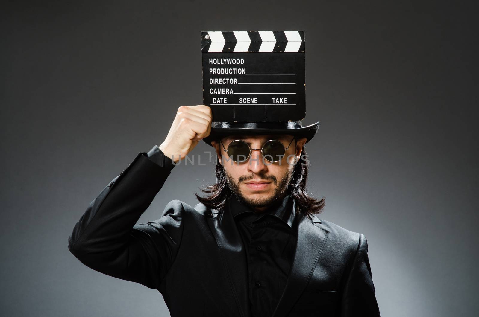 Vintage concept with man wearing black top hat